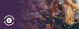 A laid jar with coins spilling out.