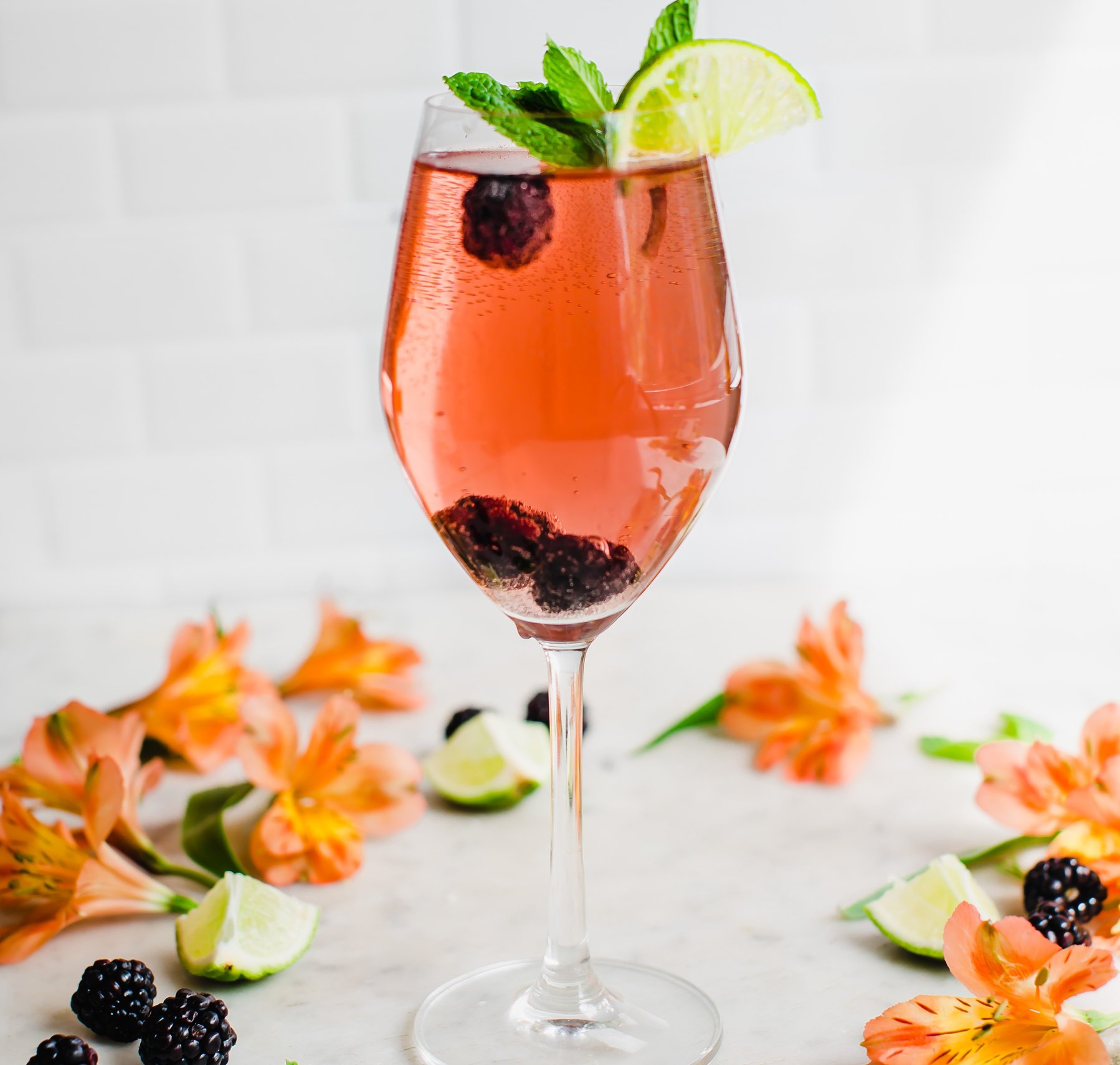 Sparkling Prickly Pear Iced Tea with Muddled BlackberryMint