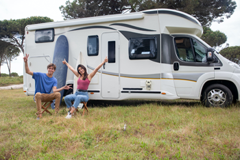 rv loan rates at americas credit union make owning an rv easy couple in front of their new rv