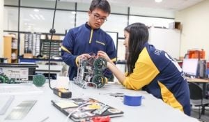 Concordia students working together on a project.