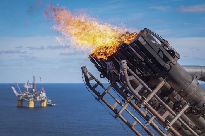 flare tip and offshore platform in background