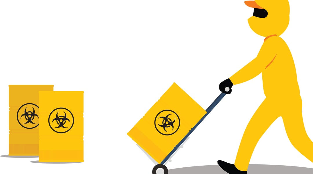 vector image or person in hazmat suit disposing of healthcare waste