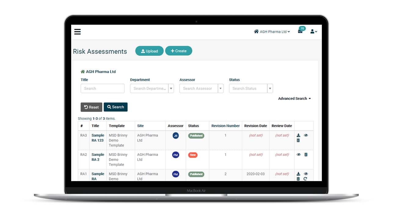 Laptop open showing Saas software with risk assessment template on the screen