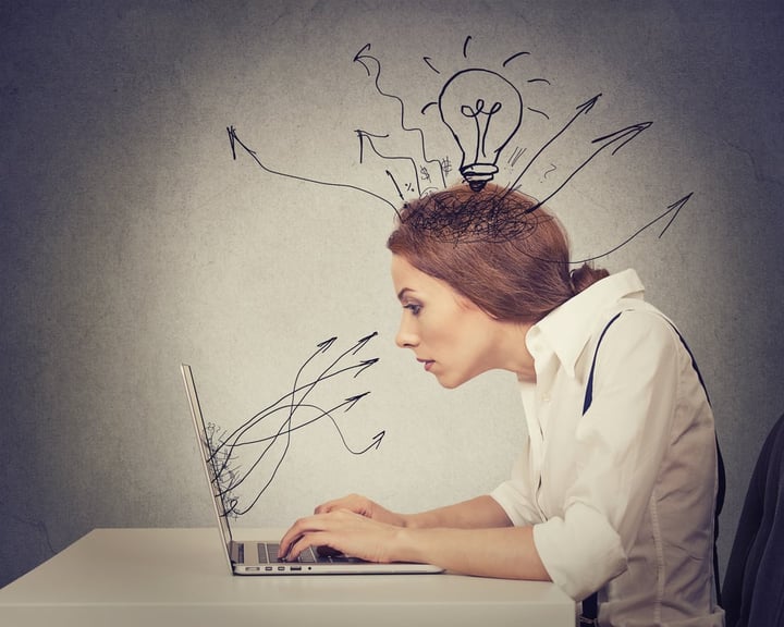 Young business woman working typing on computer in her office-2