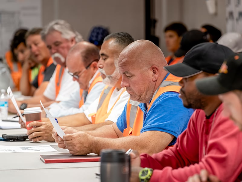 Employees at safety program