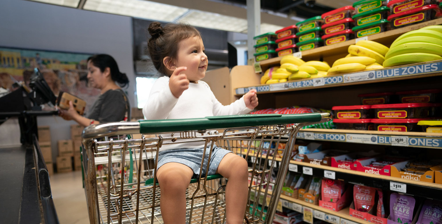 child in Blue Zones healthy checkout lane