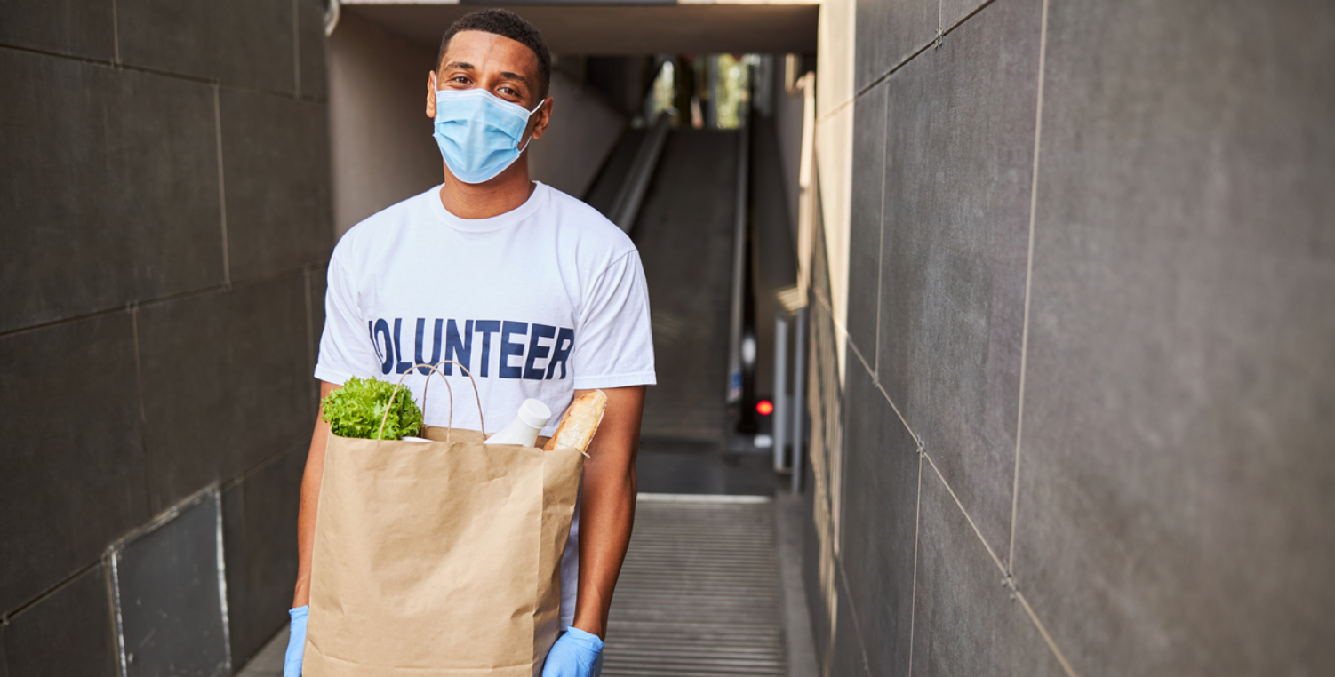 Volunteer with mask for safety