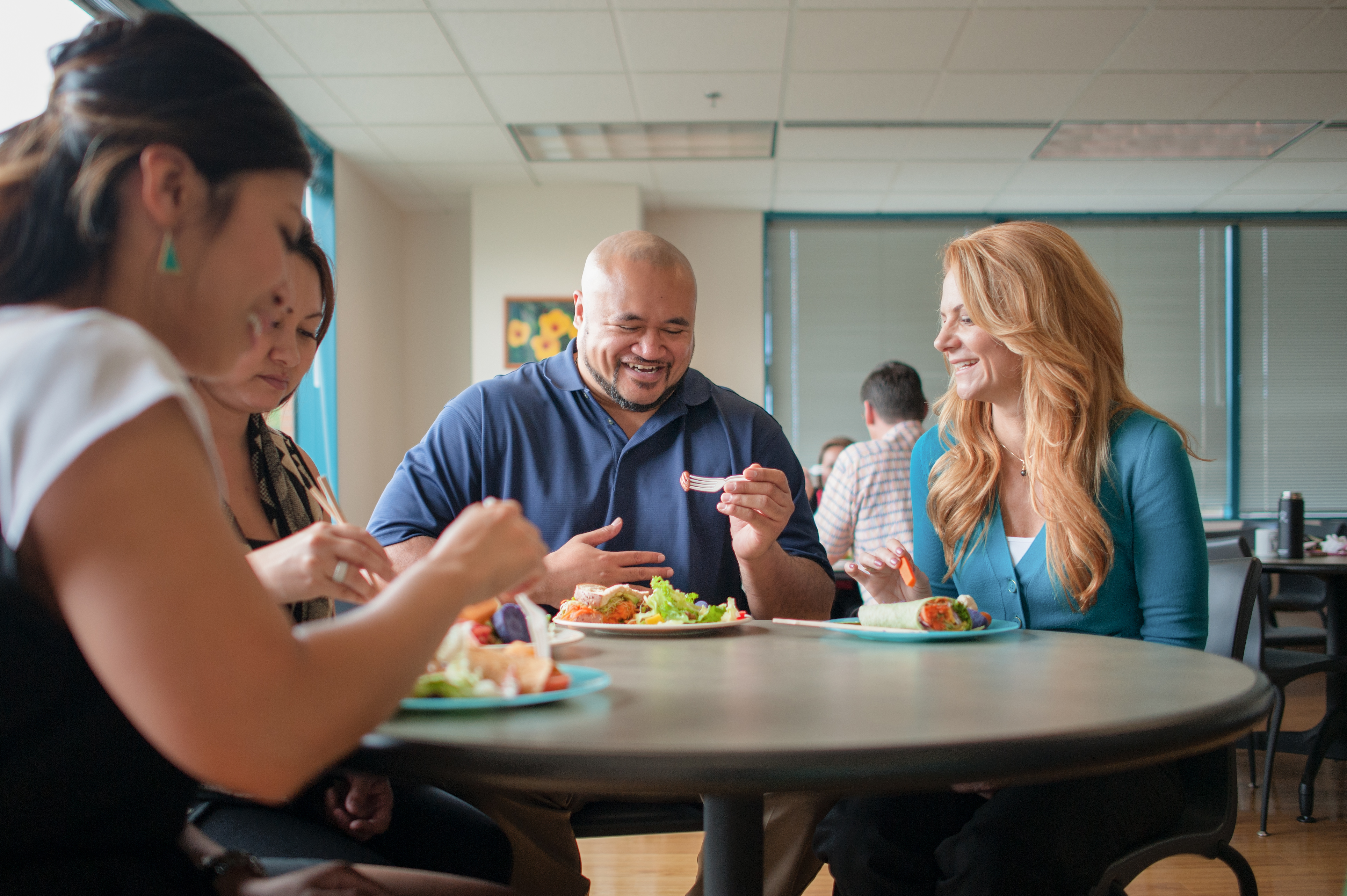 group of colleagues eating together