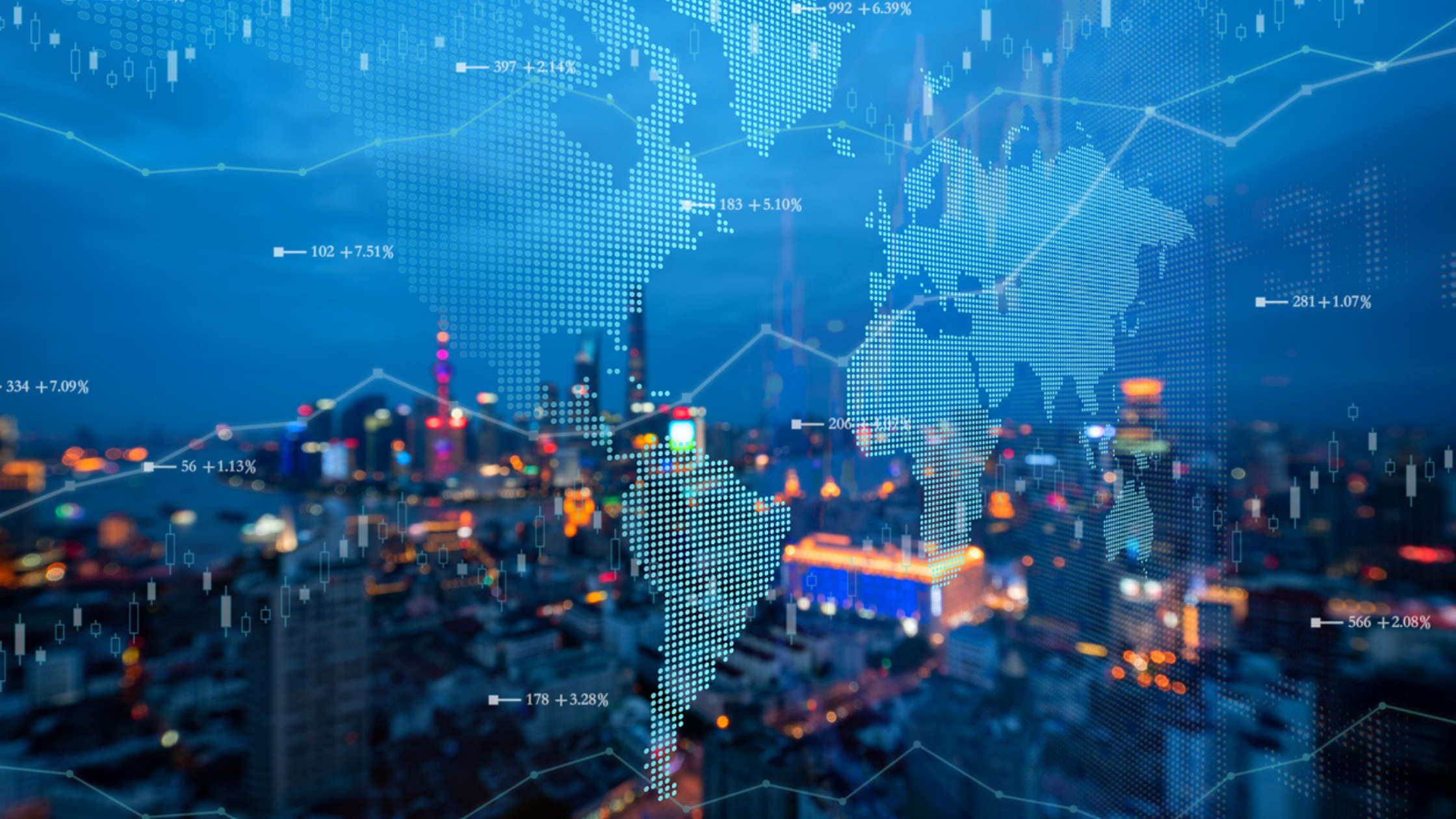 Cityscape at night with graphic overlay of world map connected through tech and MLS data.