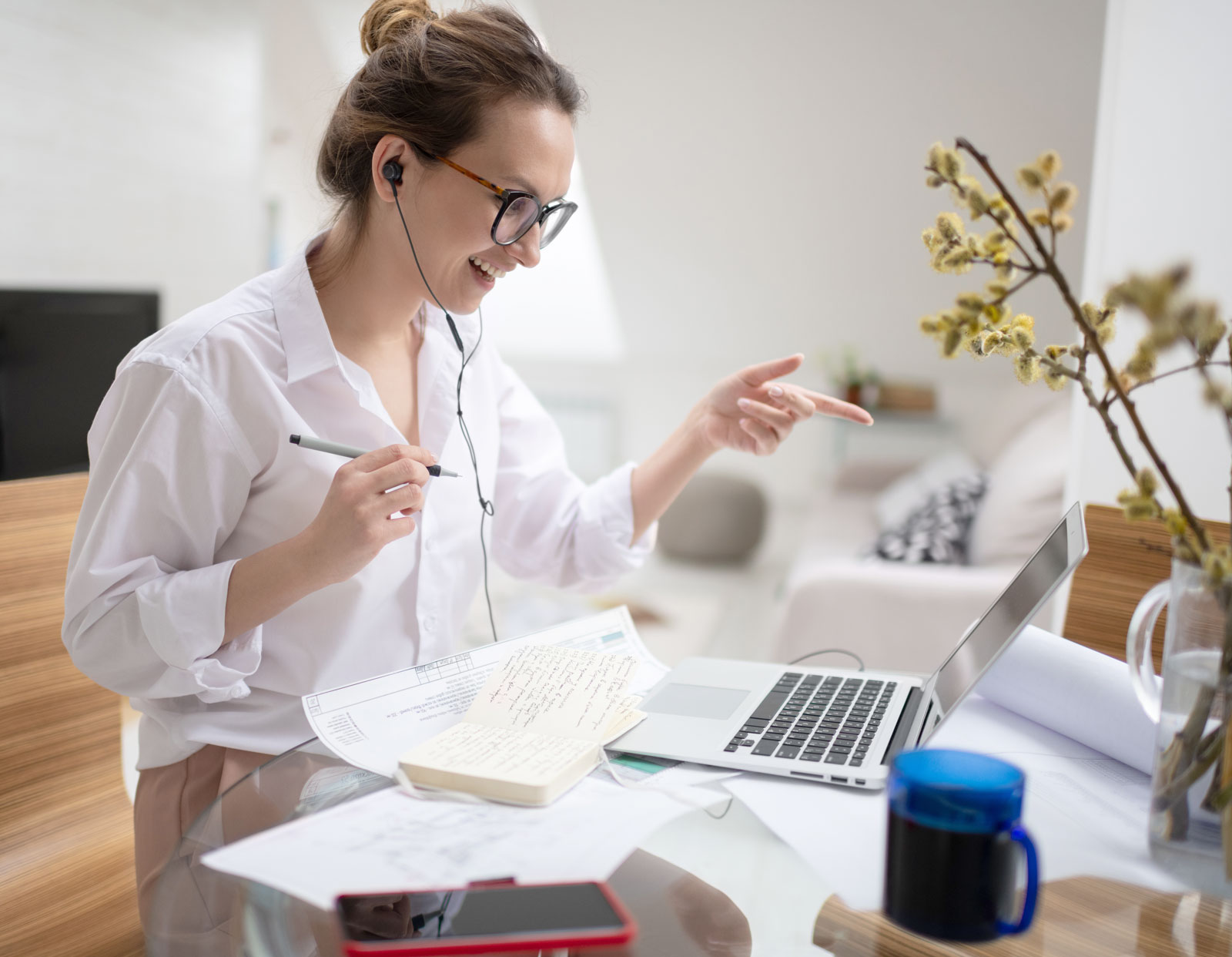 cheerful-businesswoman-having-online-conversation