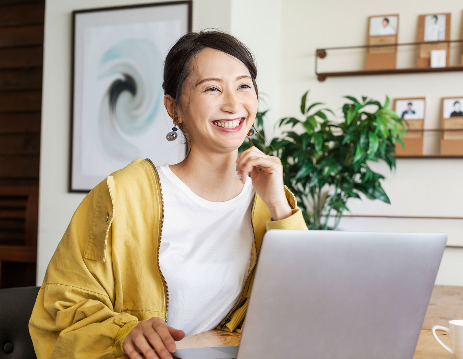 female-japanese-professional-sitting-at-a-table
