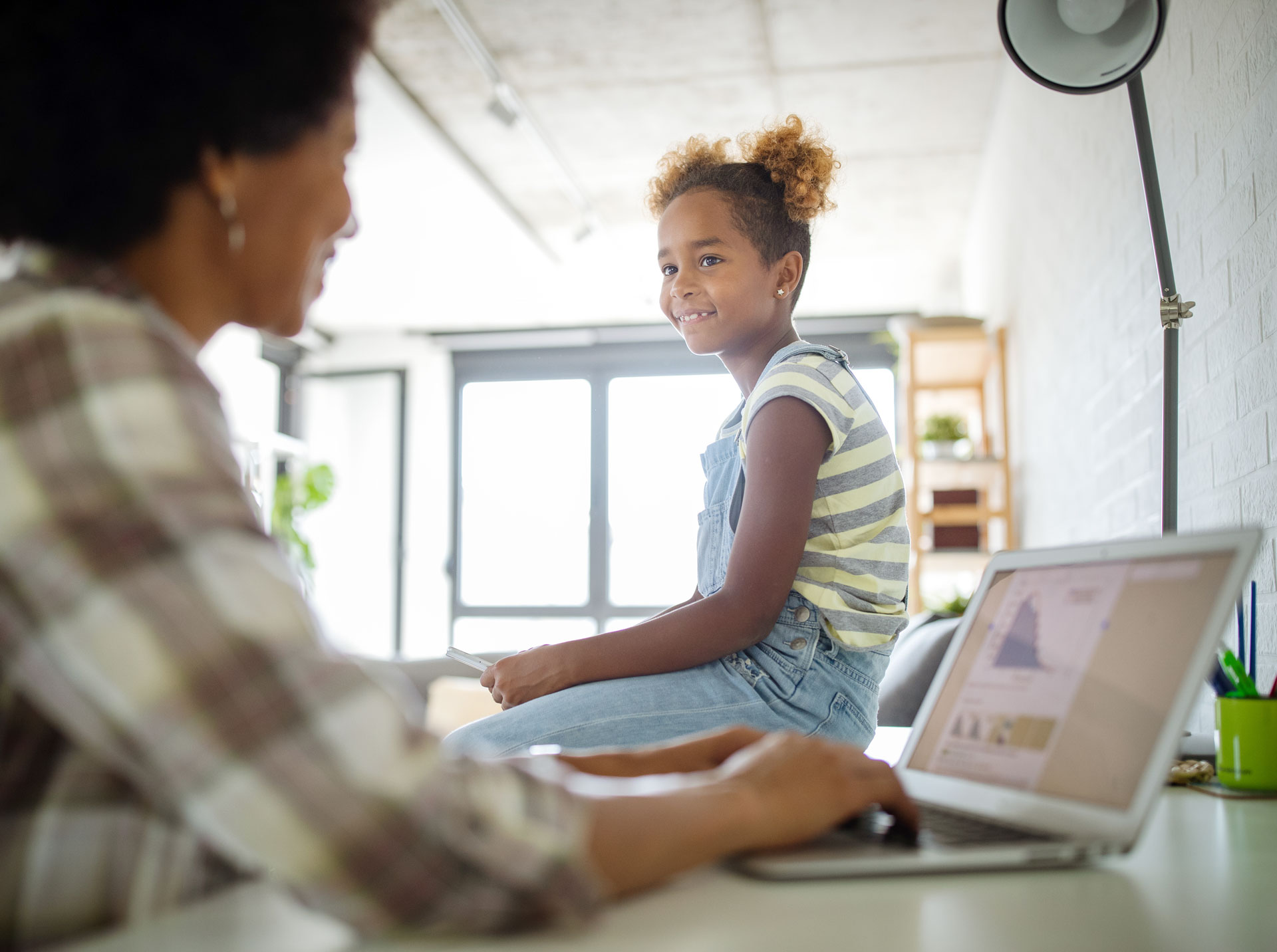 happy-family-mother-and-child-daughter-at-home-working
