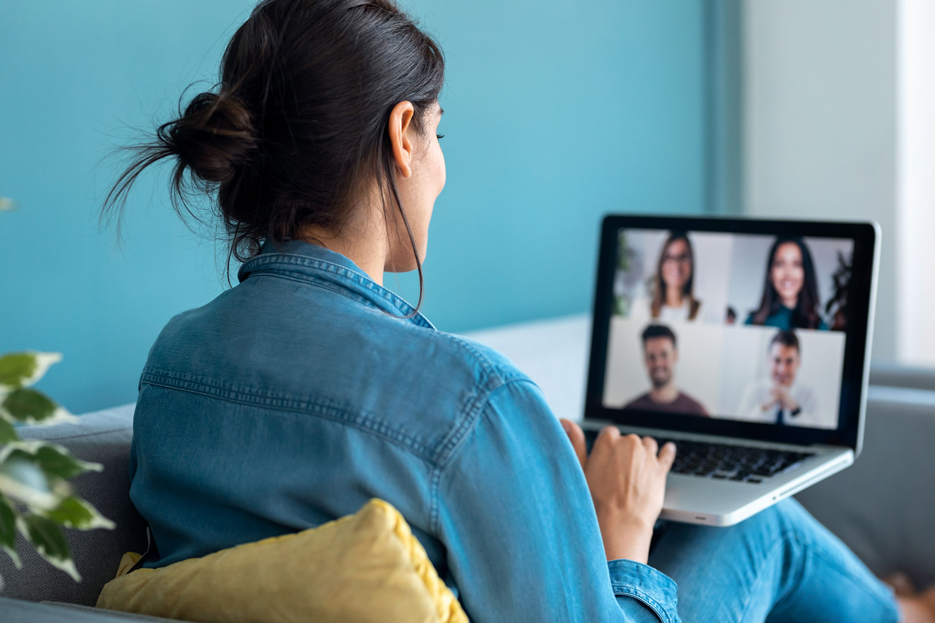 woman-speaking-on-video-call-with-diverse-colleagues