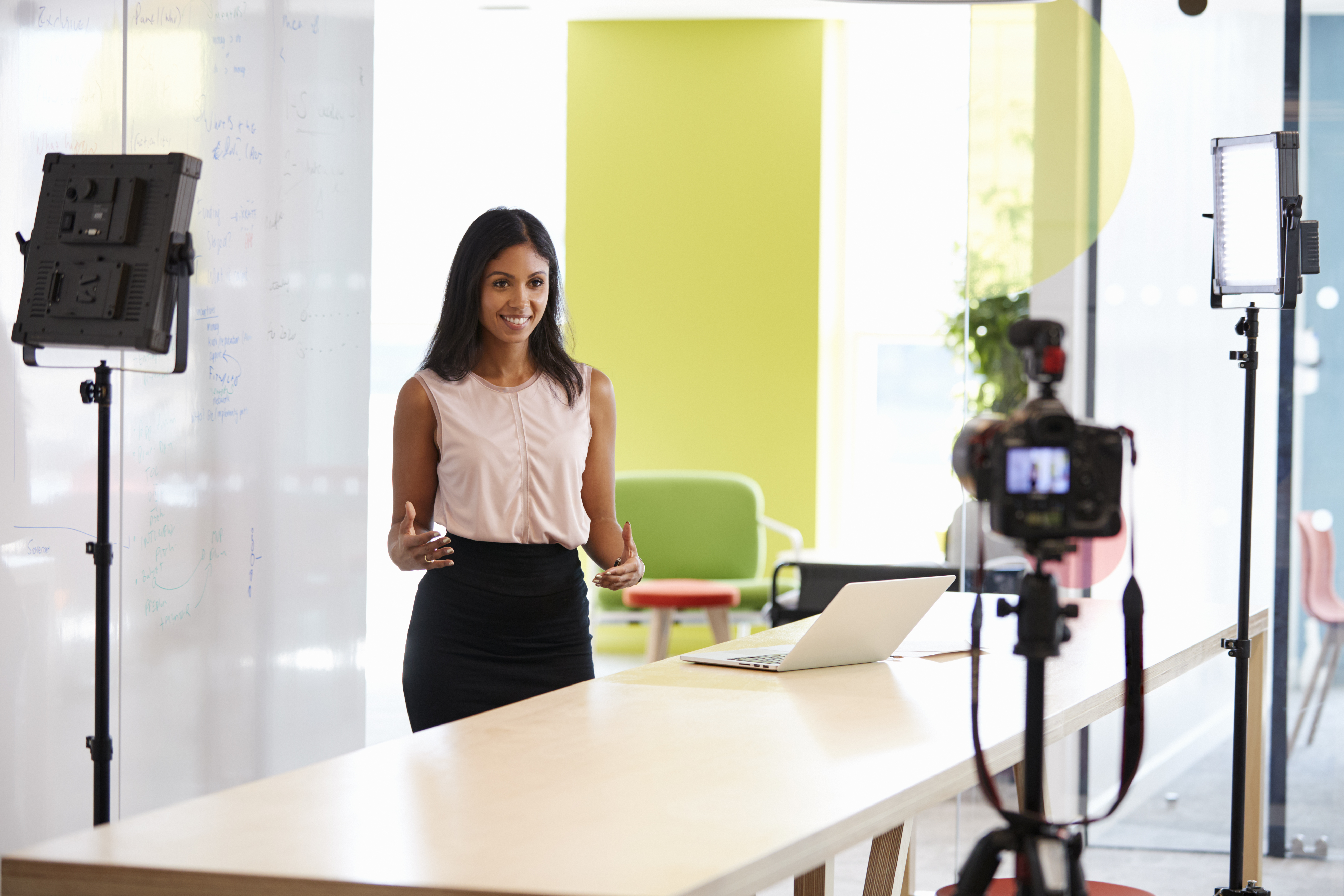 young-woman-making-a-corporate-demonstration-video-PLW7P8M