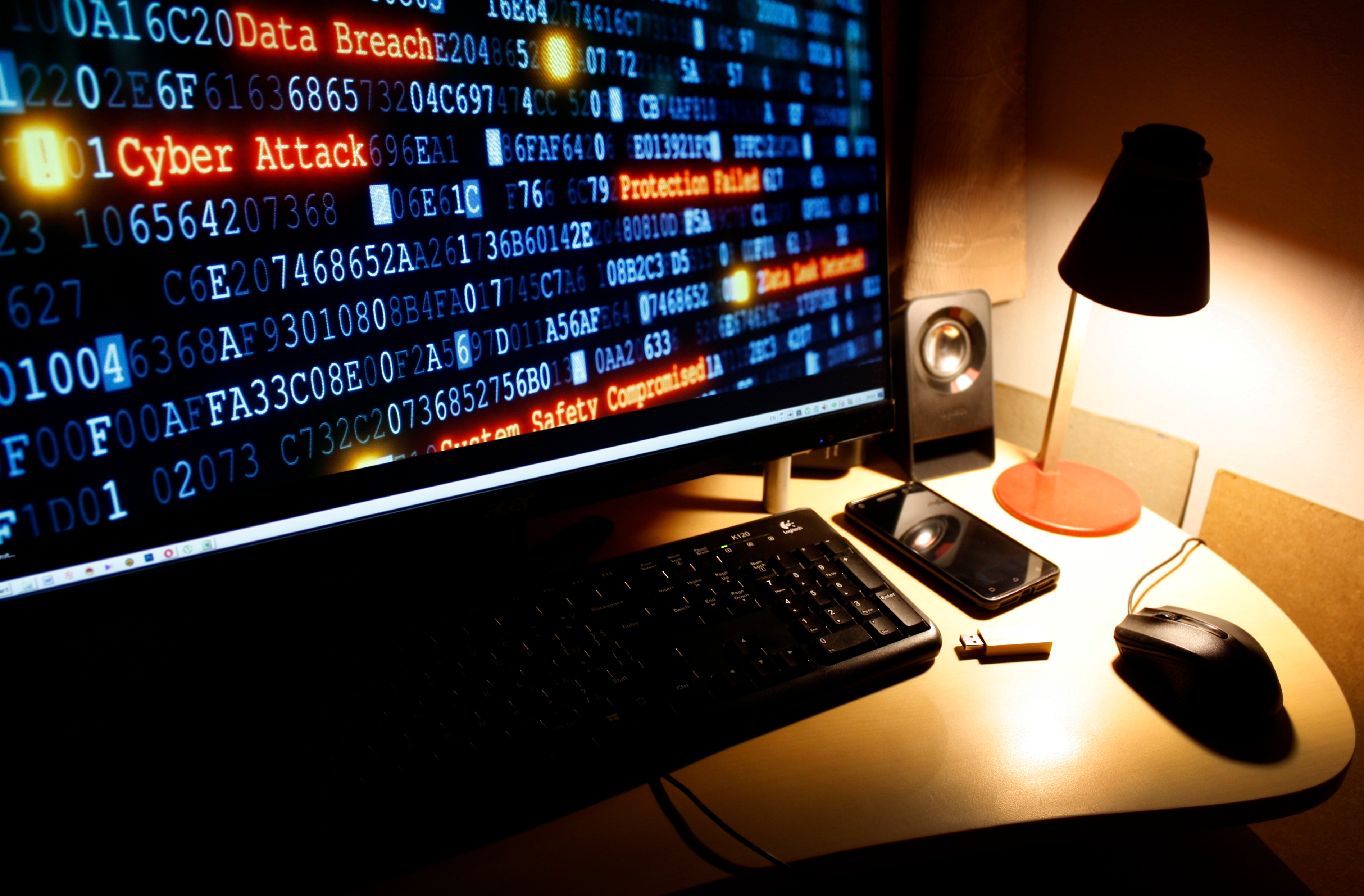 cyber-crime-cyber-attack-hacking-computer-desktop-MDCX8BS-1