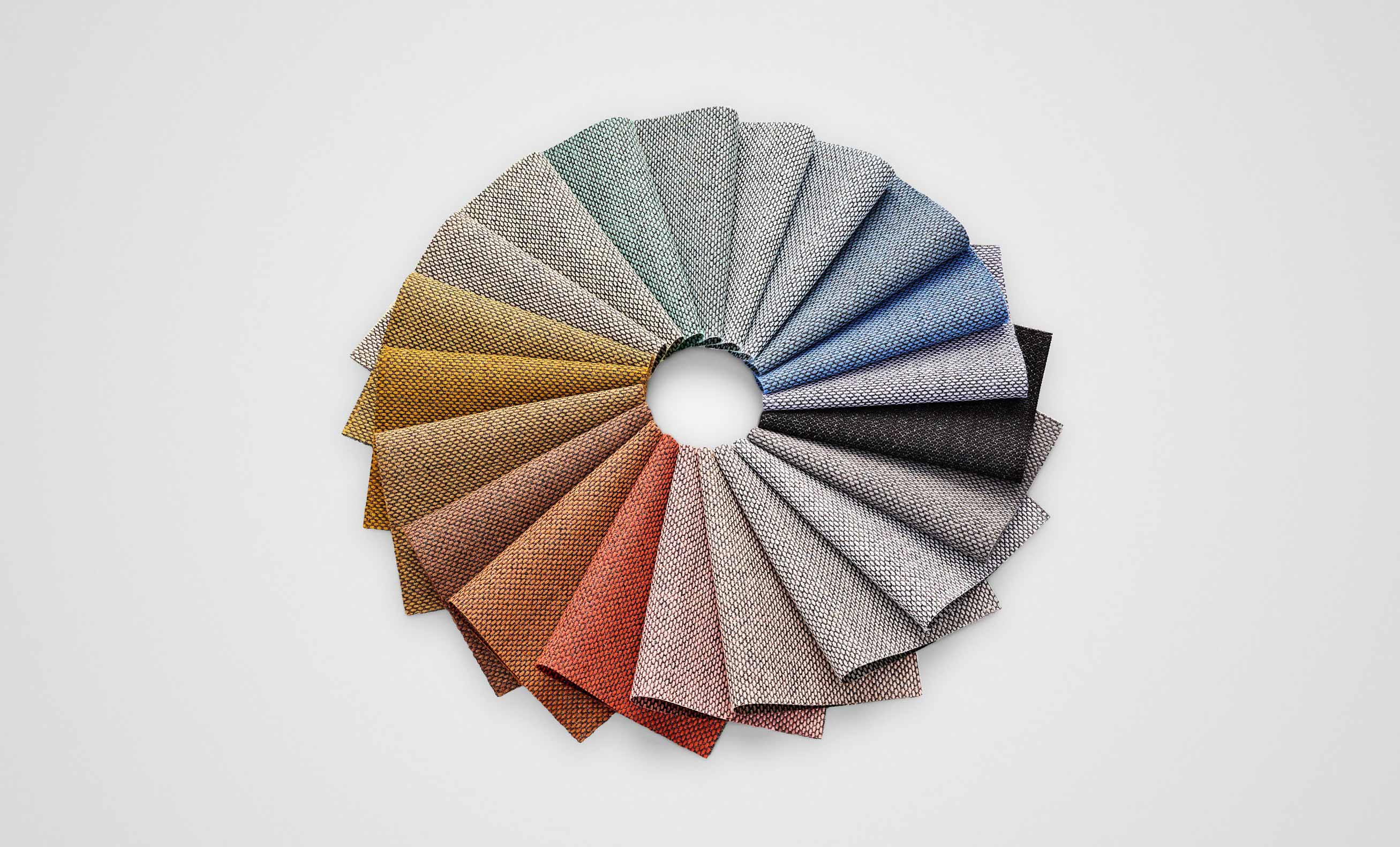 selection of re-wool fabric colour samples laid out in a wheel shape