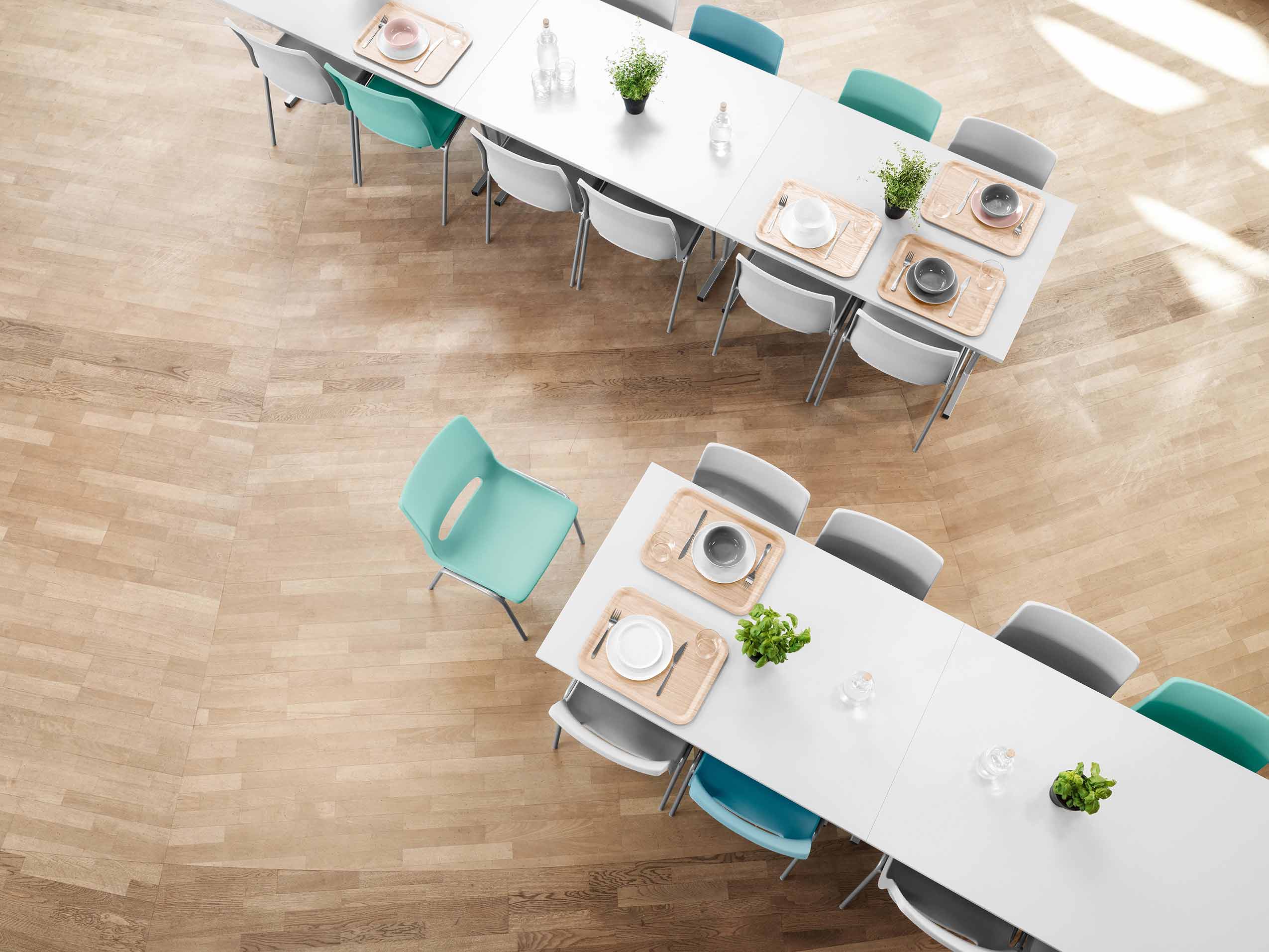 sea green and white RBM Ana Chairs in a canteen