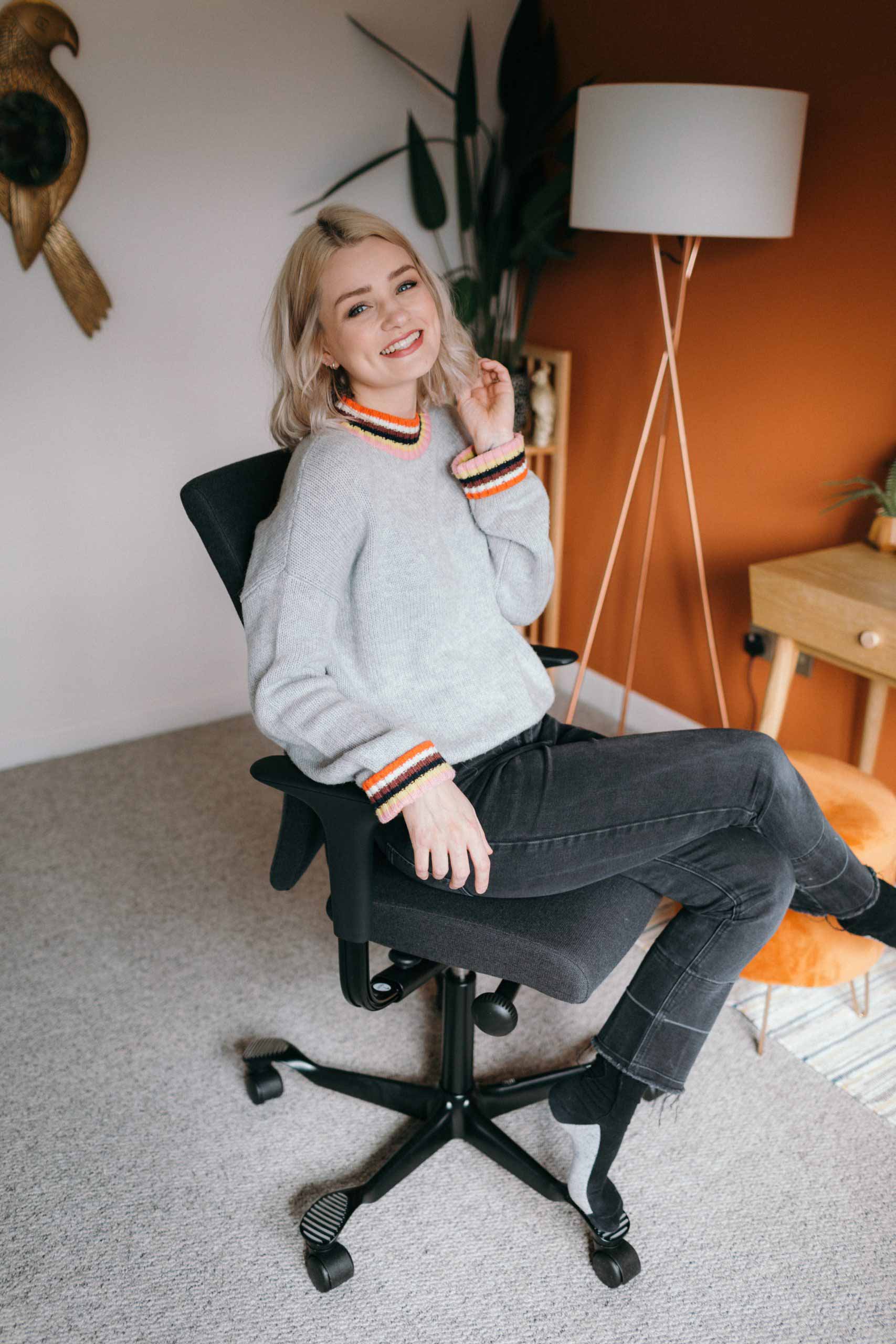 Laura Bradshaw sat on a HÅG Creed chair in her home office