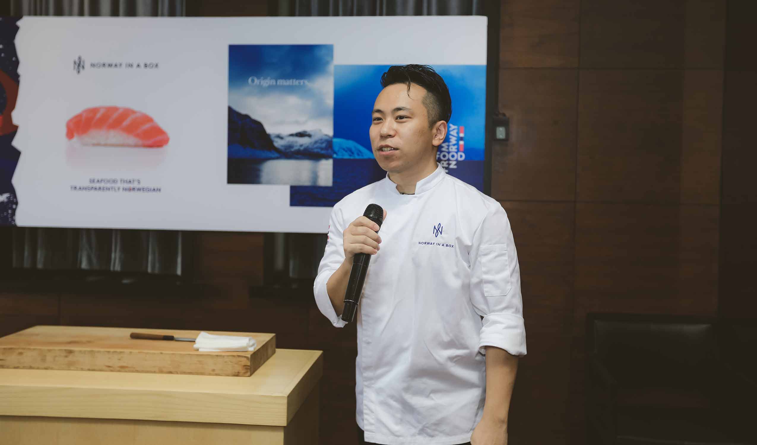 Chef speaking about sustainability at Table of Norway event in Shanghai