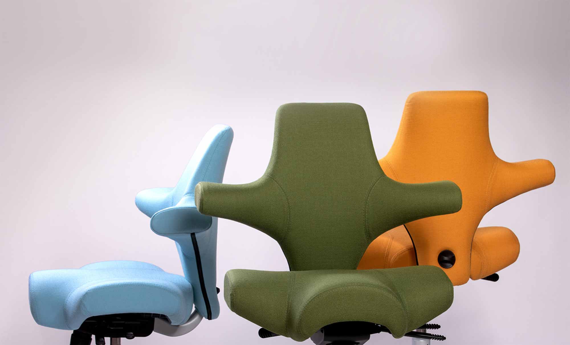 three hag capisco chairs in blue green and yellow select fabric