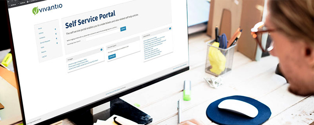 resource-library-Image-man-at-computer-1000x400px