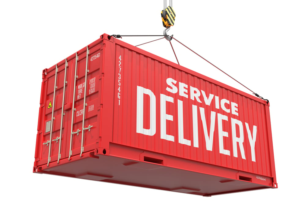 https://f.hubspotusercontent10.net/hubfs/4004065/Service%20Delivery%20-%20Red%20Cargo%20Container%20hoisted%20by%20hook%2C%20Isolated%20on%20White%20Background..jpeg