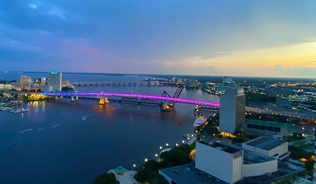Acosta Bridge in Jacksonville, Florida lit up at sunset.