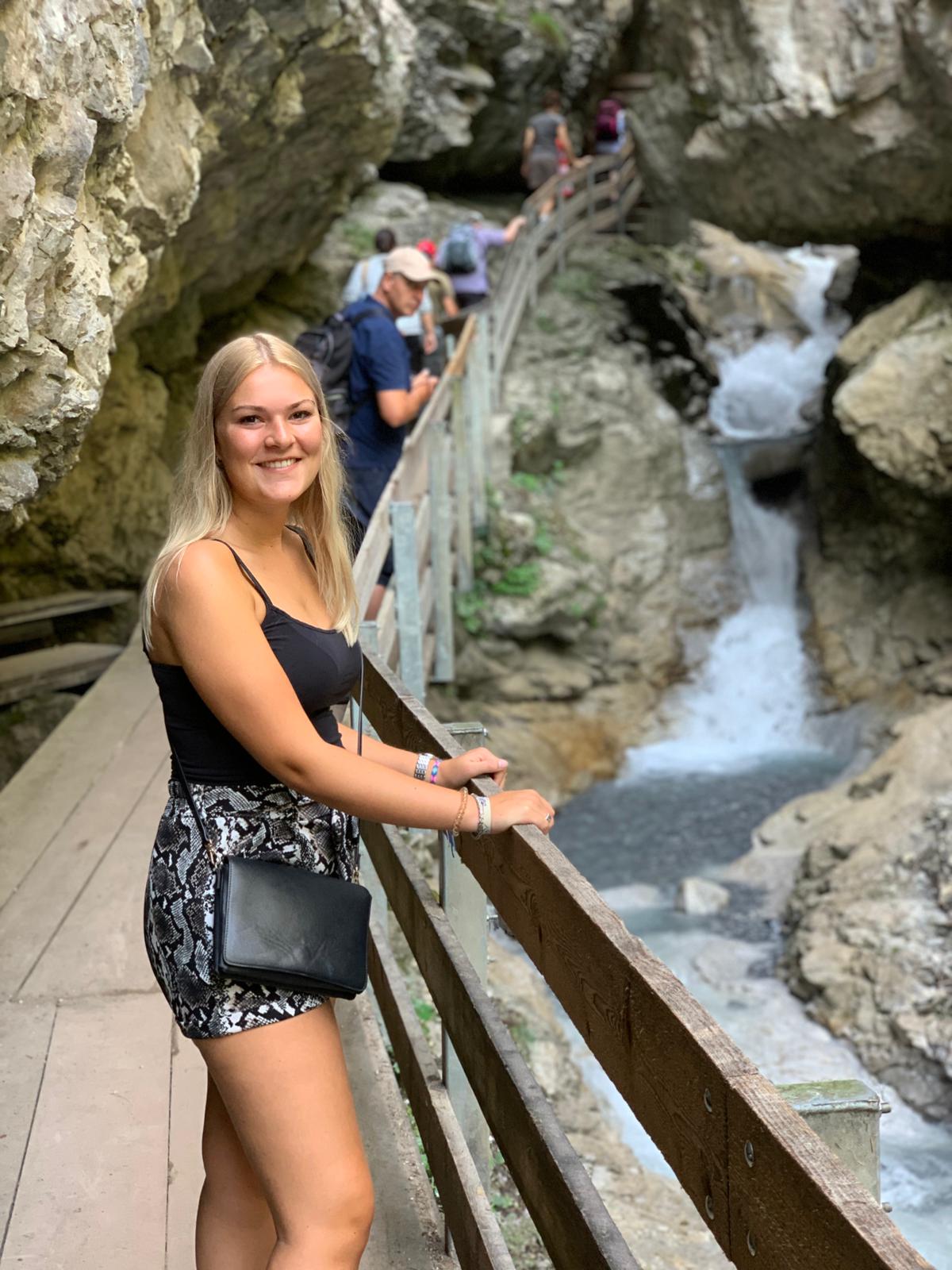 Girl poses in a gorge in austria