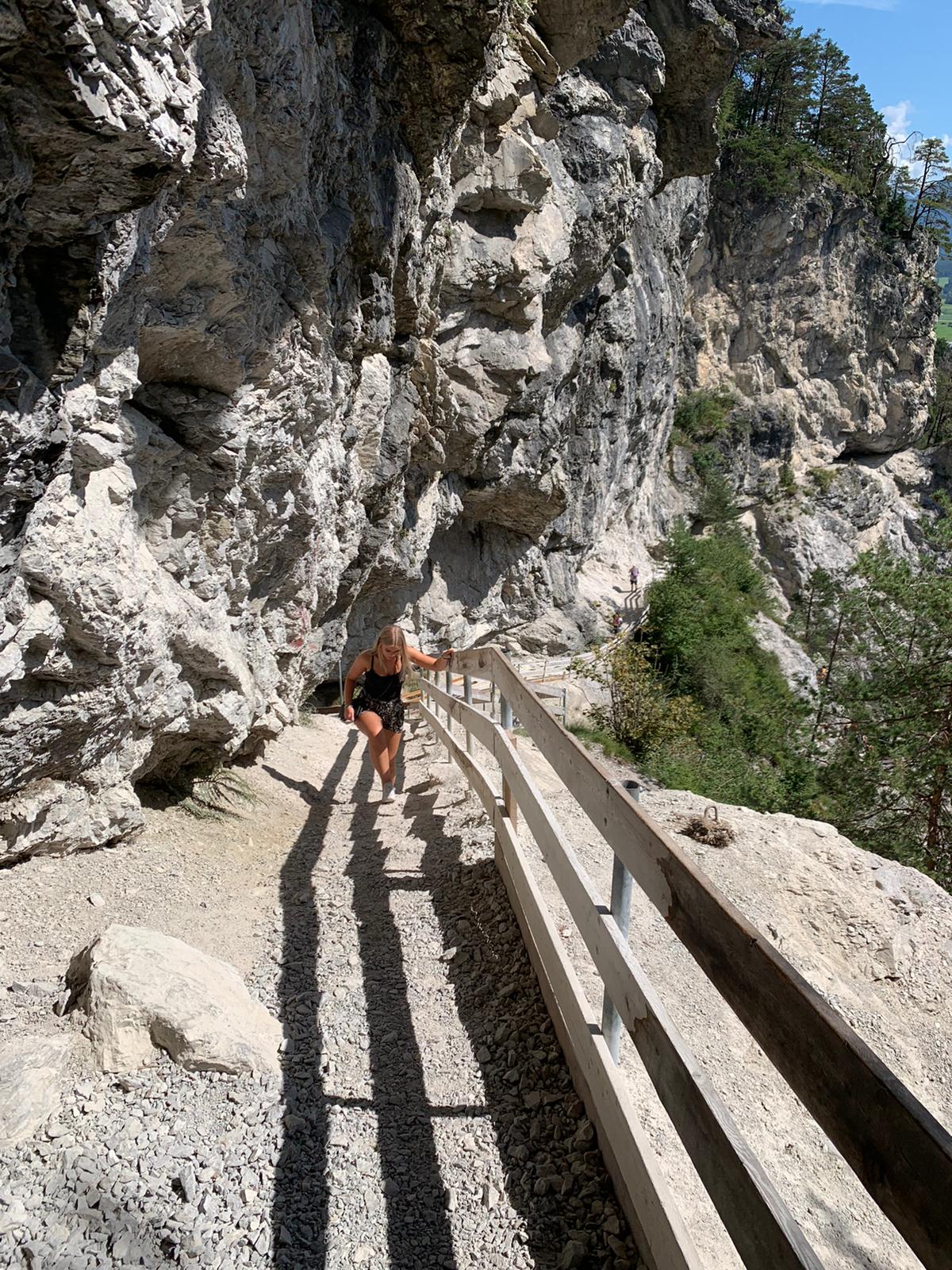 Girl walking through a gorge in austria