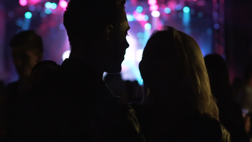 Dancing couple in club