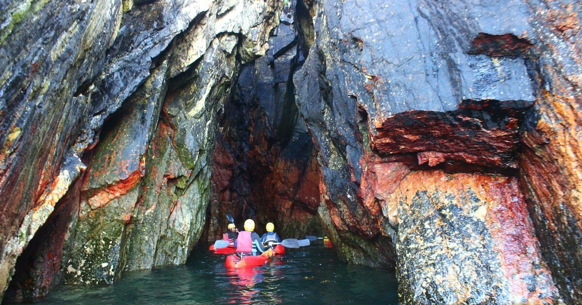 Sea kayaking cave
