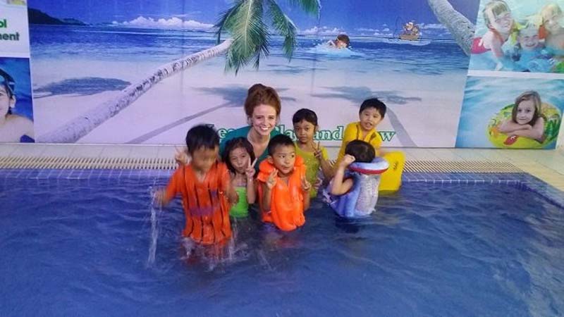 a female Canadian English teacher and her ESL kids