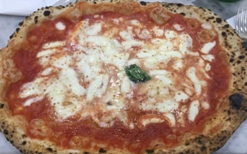 Eating pizza in Rome, Italy