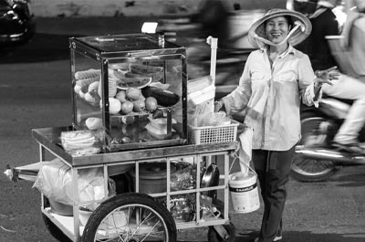 Kelly_B_Strunk-Vietnam-Ho_Chi_Minh_City-Happy_Street_Vendor
