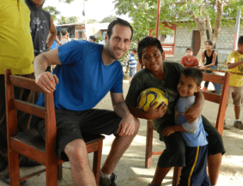 a male English teacher in Nicaragua with TEFL students