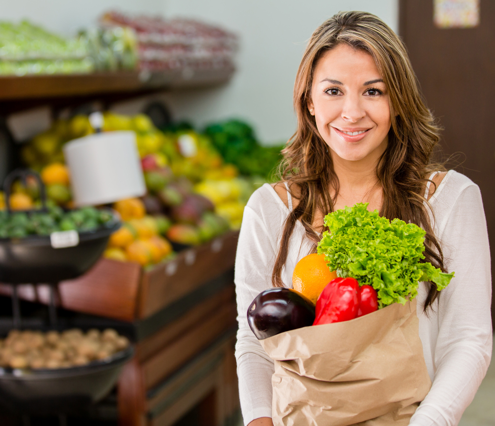 Woman grocery shopping at the local market