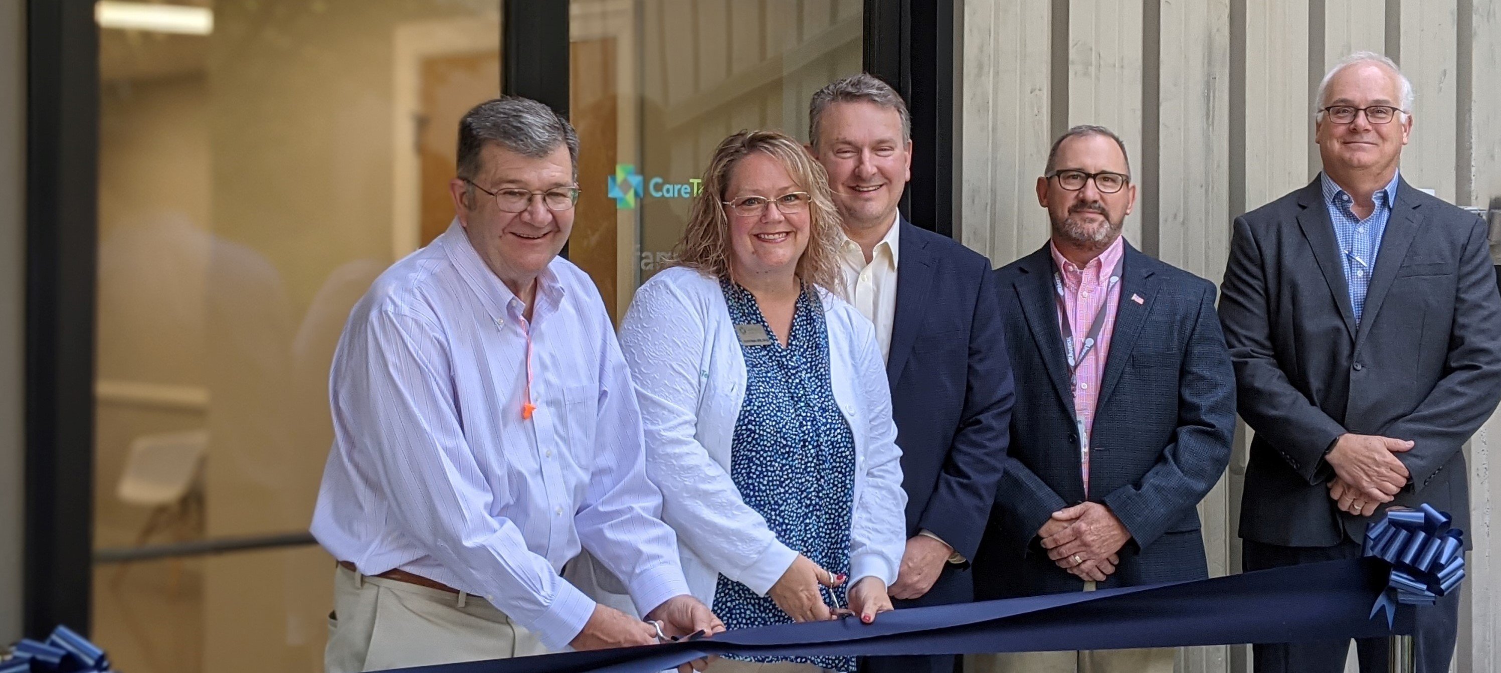 Ribbon cutting ceremony narrow